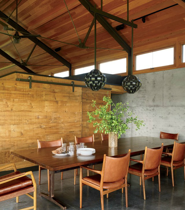 vintage-lightolier-pendants-from-20th-century-gallery-are-paired-with-a-custom-made-walnu
