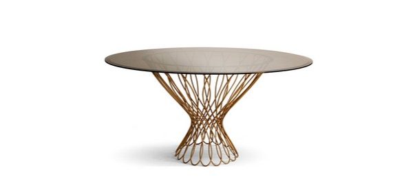A round dining table is the perfect choice if you want your dining room to be the perfect space to spend some quality time and lovely meals with guests. Allure dining table by KOKET has a very feminine design that will fill the dining room with glamour and elegance.