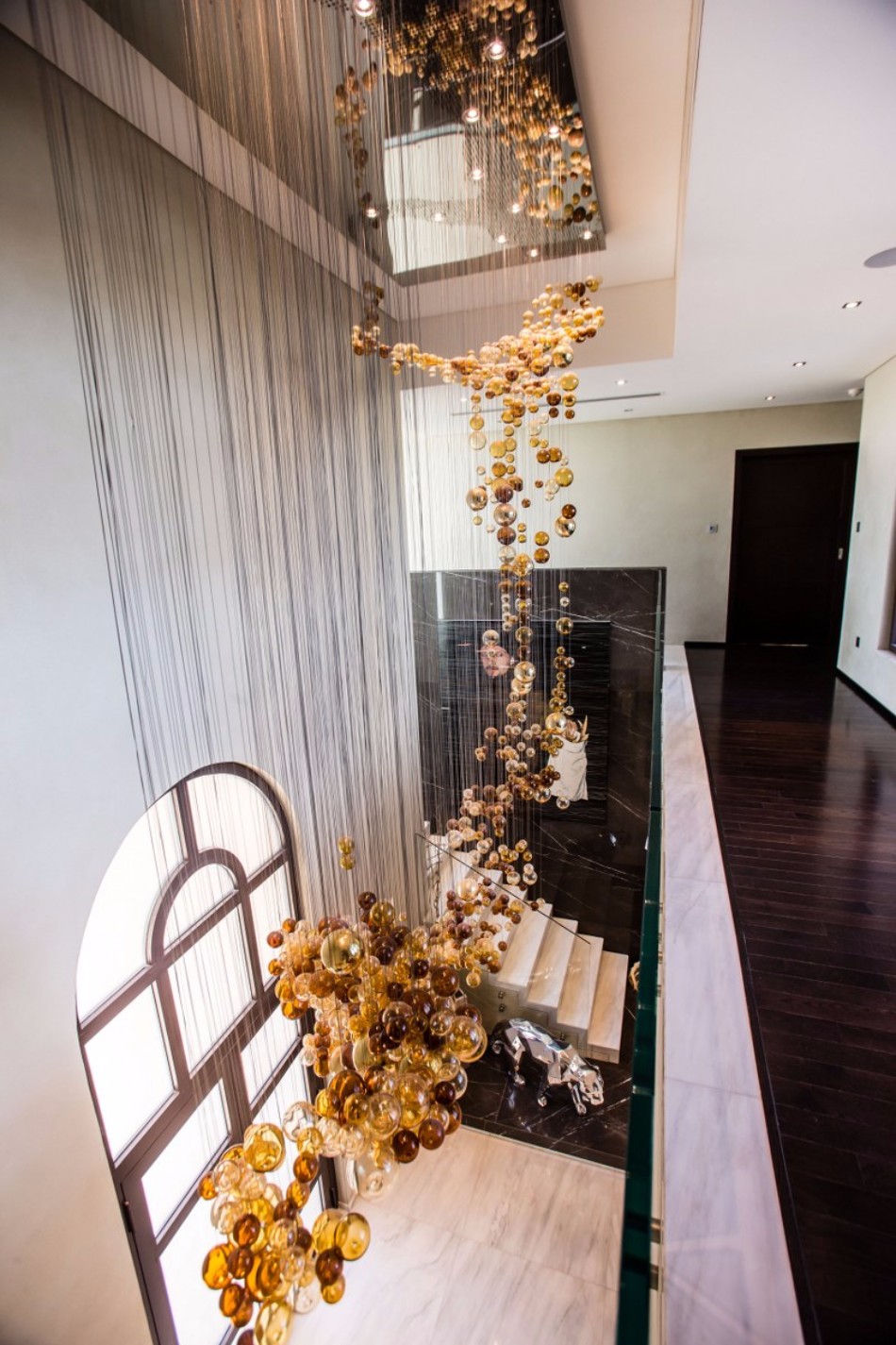 The Dining Table In The Saadiyat Private Residence | www.bocadolobo.com #moderndiningtables #diningtables #diningarea #diningroom #thediningroom #luxurious #luxury #gold #exclusivedesign #interiordesign #topinteriordesigners #bestinteriordesigners #famousinteriordesigners @moderndiningtables