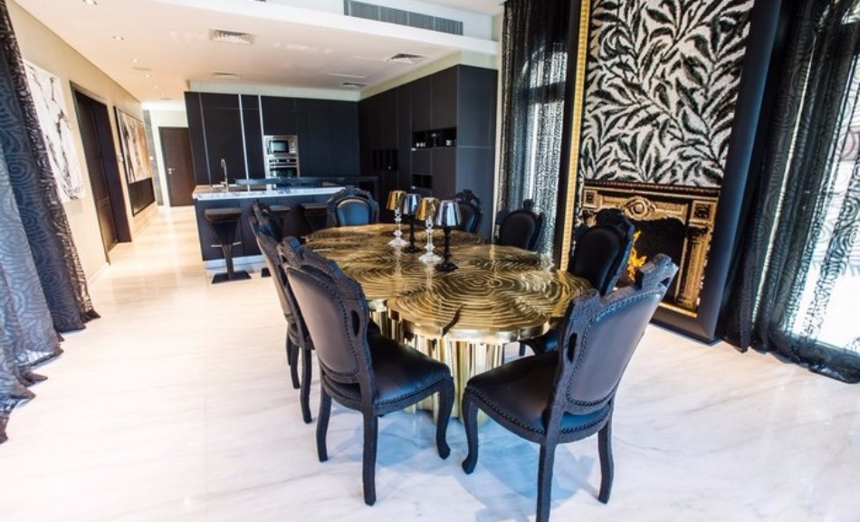 The Luxury Dining Table In The Saadiyat Private Residence | www.bocadolobo.com #moderndiningtables #diningtables #diningarea #diningroom #thediningroom #luxurious #luxury #gold #exclusivedesign #interiordesign #topinteriordesigners #bestinteriordesigners #famousinteriordesigners @moderndiningtables